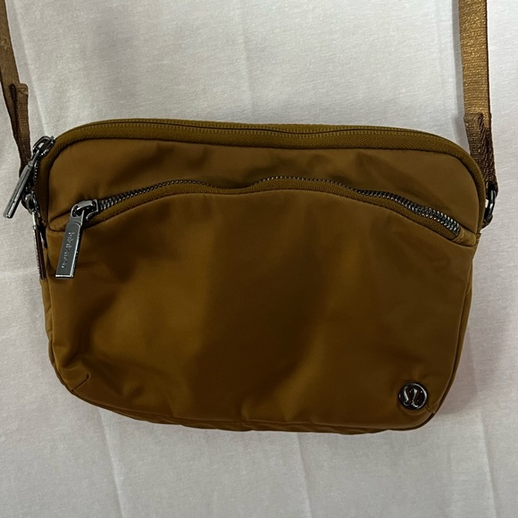 Lululemon Handbags - Lululemon City Adventurer Crossbody bag camel brown color. Sold out on Lulu